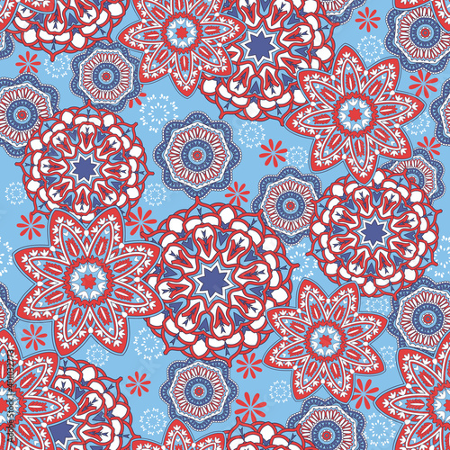 Seamless paisley mandala pattern with folk geometric flowers. Indian stylized floral texture for textile or wrap. Festival oriental background with mehendi doodle hand drawing