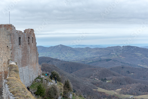 Men in Cathar castle of Montsegur in Ariege, Occitanie in south of France in winter 2020