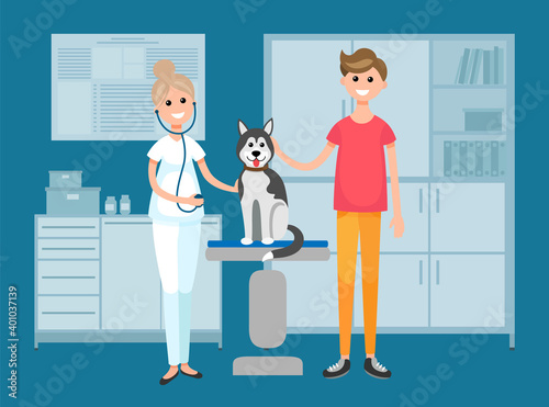 Vet doctor holds husky on examination table in. Veterinarian with a phonendoscope working with a dog. Domestic animals treatment concept. Owner of pet communicates with doctor in vet clinic