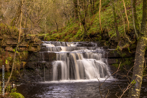 Fototapeta Naklejka Na Ścianę i Meble -  Ash Gill near Alston in Cumbria, is located in an area of outstanding natural beauty close to the Lake District National Park, is a beautiful stretch of water with many picturesque waterfalls