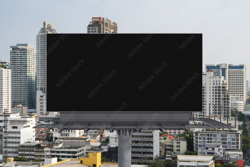 Blank black road billboard with Bangkok cityscape background at day time. Street advertising poster, mock up, 3D rendering. Front view. The concept of marketing communication to promote or sell idea.