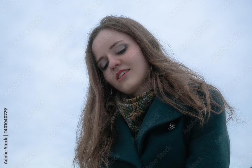 Portrait of a young smiling girl outdoors Portrait of a young smiling girl outdoors
