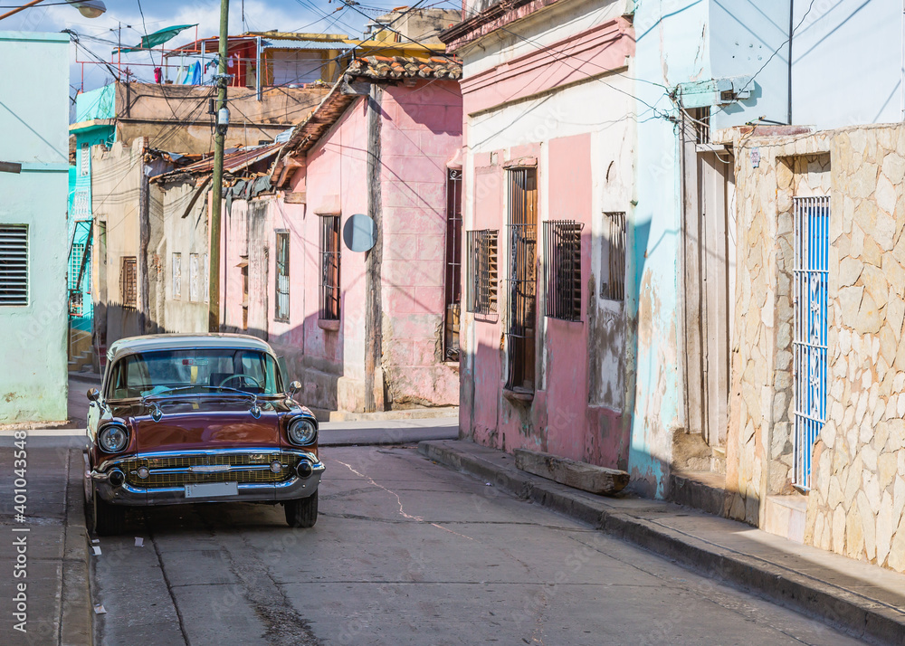 classic car parking on the street in santiago de cuba,cuba