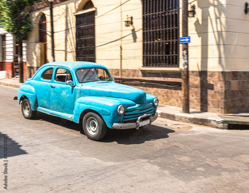 classic car on the street in santiago de cuba, cuba