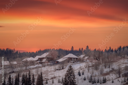 An incredibly mesmerizing and dramatic sunrise over the Kusye-Aleksandrovsky village