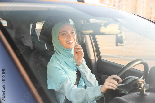 Young Muslim woman in moder...