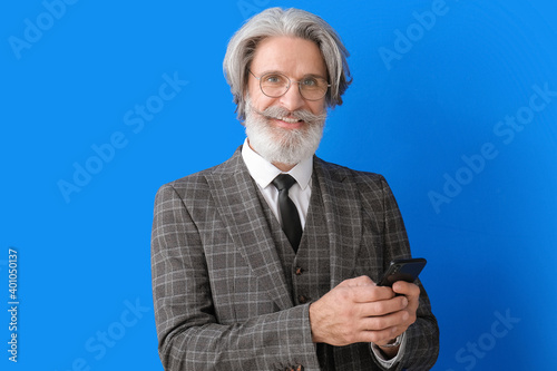 Portrait of senior business...