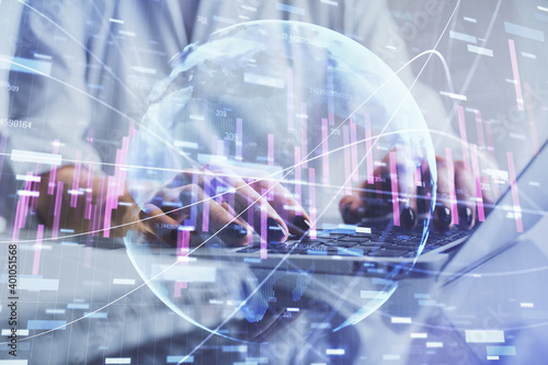 Double exposure of woman hands typing on computer and forex chart hologram drawing. Stock market invest concept.