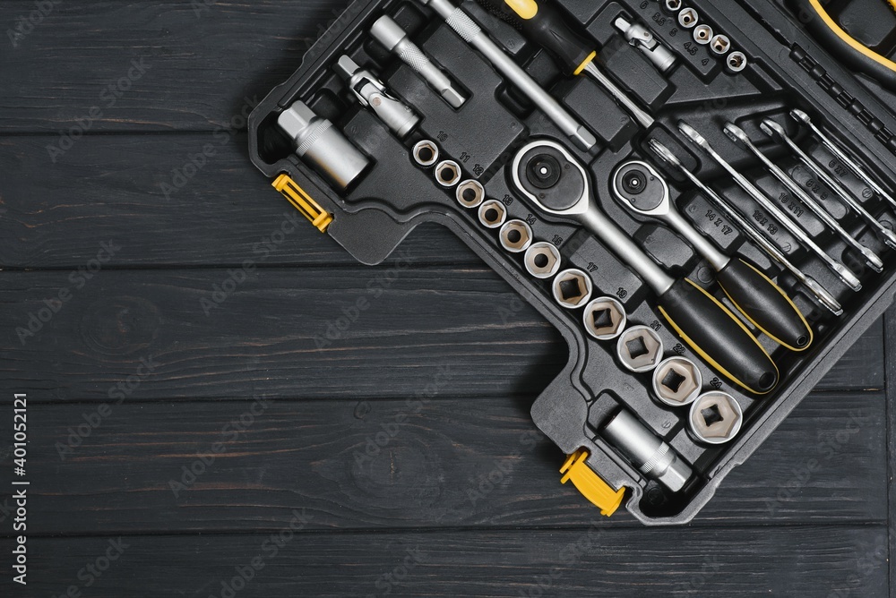 Fototapeta premium Set of tools for car repair in box, closeup