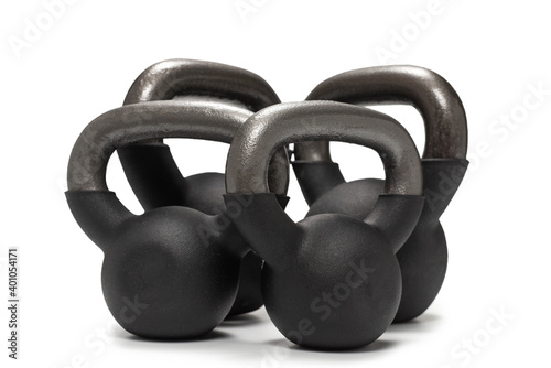 Black weight isolated on white. 4 kg weight. Fitness for women.