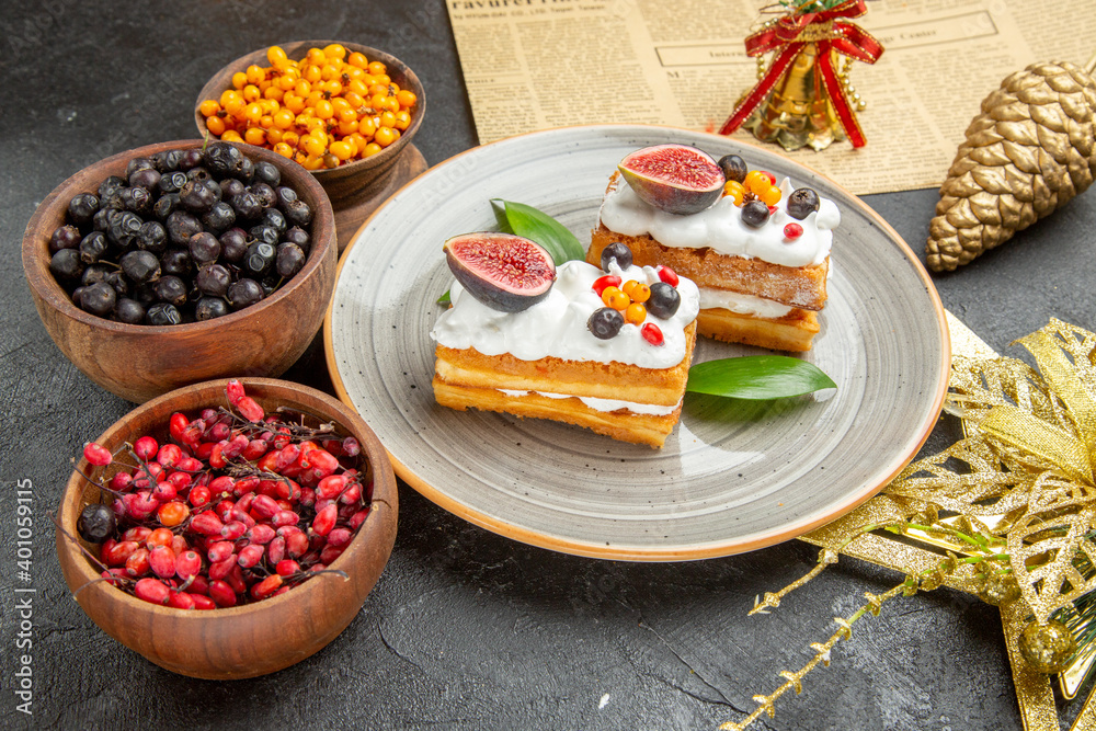 front view delicious waffle cakes with fruits on dark background sweet cake photo cream dessert front view delicious waffle cakes with fruits on dark background sweet cake photo cream dessert