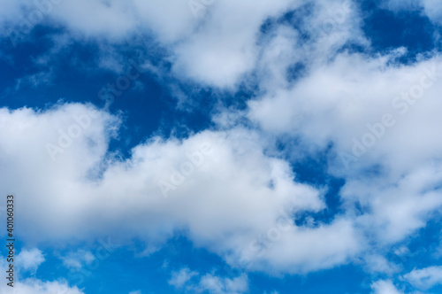 gorgeous  blue sky with fluffy clouds  textures copy space background