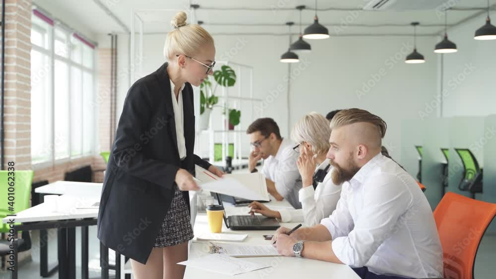 Chef scolds employees for a poor result at work, female boss disssatisfied with work of two workers. Chef scolds employees for a poor result at work, female boss disssatisfied with work of two workers.