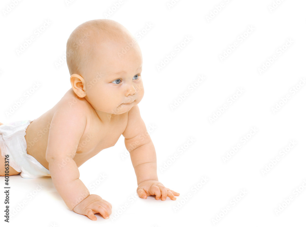 Portrait of cute baby crawling on the floor over a white background Portrait of cute baby crawling on the floor over a white background