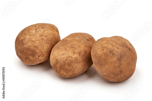Unwashed potatoes  isolated on white background