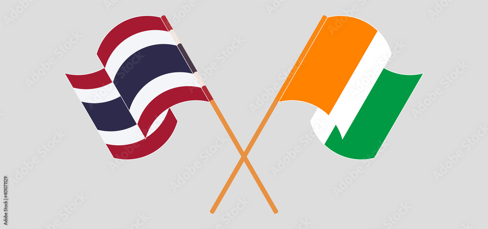 Crossed and waving flags of Thailand and Republic of Ivory Coast Crossed and waving flags of Thailand and Republic of Ivory Coast