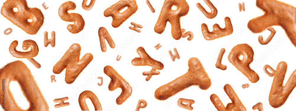 Chaotic flying letters made of real cookies, isolated on white background, closeup Chaotic flying letters made of real cookies, isolated on white background, closeup