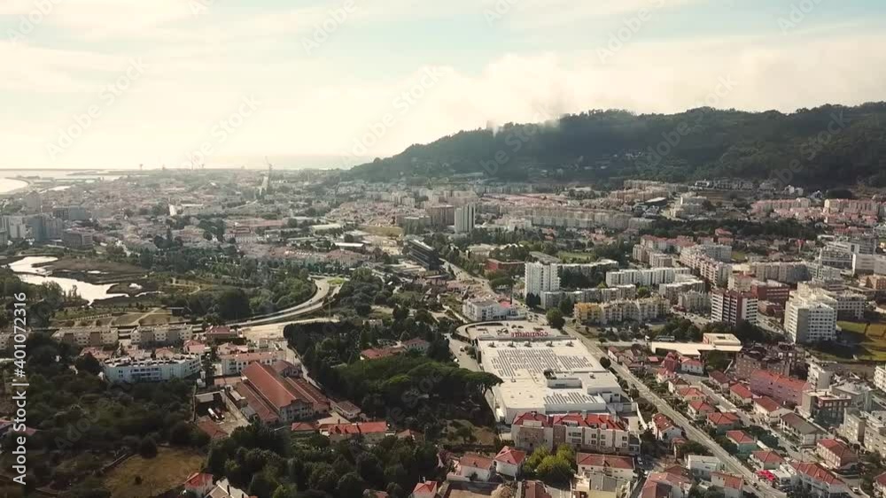 view of the city Viana do Castelo Portugal look from above drone shot aerial birds eye diagonal pan flying up and moving sideways sunny day 