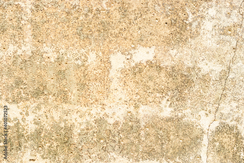 Fototapeta premium Texture of a concrete wall with cracks and scratches which can be used as a background