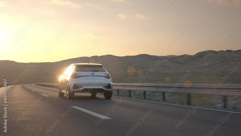 Aerial view of a self driving autonomous electric car driving along a desert road in to the sunset. E-mobility concept. Realistic high quality 3d animation.