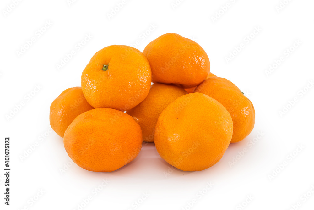 Ripe citrus tangerines isolated on a white background. Ripe citrus tangerines isolated on a white background.