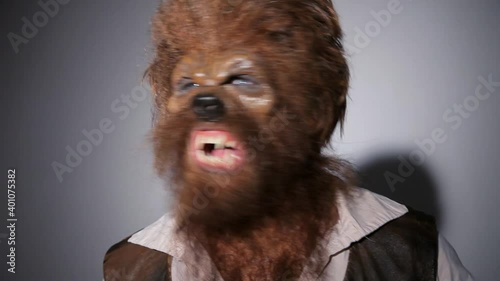 Close up of angry male werewolf swaying and growling