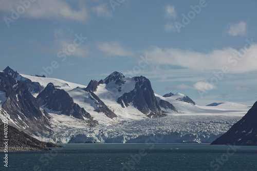 The coastline and mountains of Liefdefjord in the Svalbard Islands (Spitzbergen) in the high Arctic photo