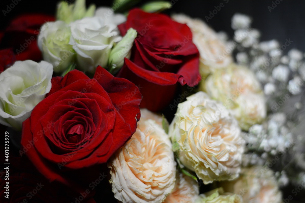 Bouquet of white and red roses on a dark background Bouquet of white and red roses on a dark background