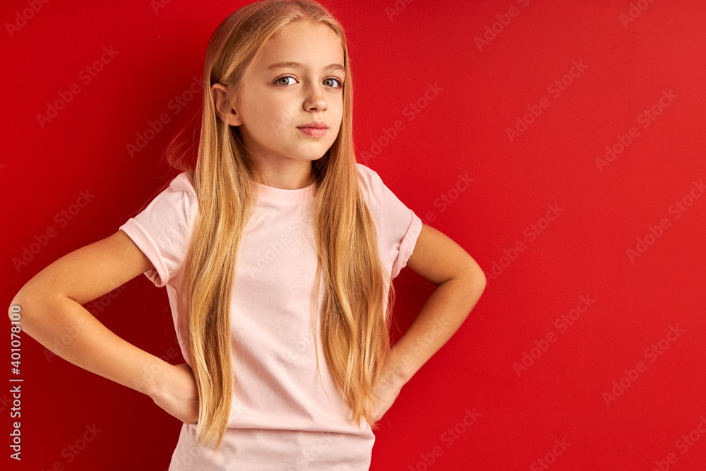 dreamy little girl in contemlation isolated in studio, caucasian child with long blond hair stand looking up dreamy little girl in contemlation isolated in studio, caucasian child with long blond hair stand looking up