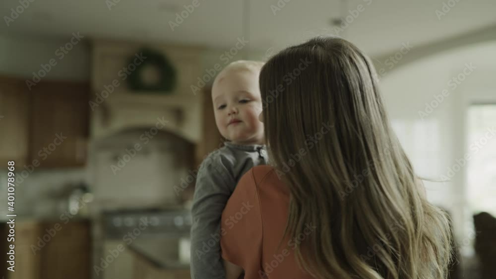 Close up of mother swaying and holding baby son / Cedar Hills, Utah, United States