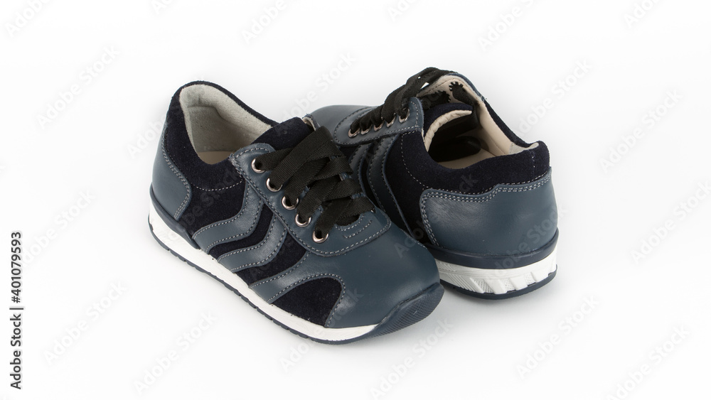children's blue orthopedic shoes on a white background children's blue orthopedic shoes on a white background