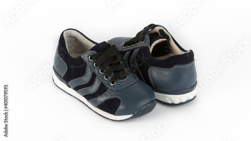 children's blue orthopedic shoes on a white background