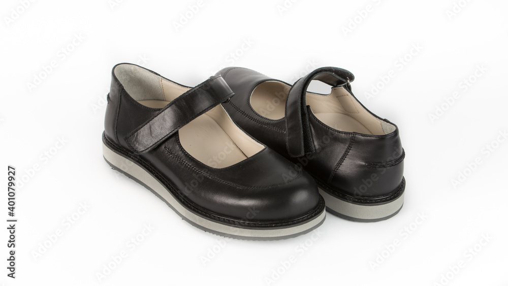 children's black orthopedic sandals on a white background children's black orthopedic sandals on a white background