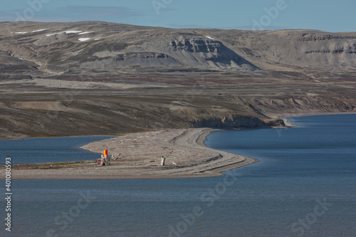 Mountains, glaciers and coastline landscape close to a village called 