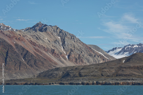 Mountains, glaciers and coastline landscape close to a village called "Ny-Ålesund" located at 79 degree North on Spitsbergen