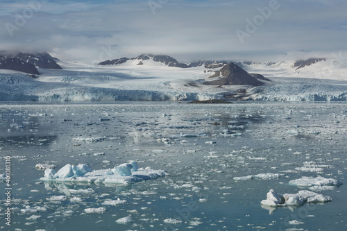 Mountains, glaciers and coastline landscape close to a village called 