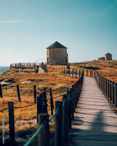 Sunset Mill (Moinho) at the beach in Apúlia, Braga, Portugal