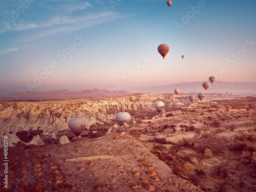 Hot air balloon in Cappadocia on the sunrise.