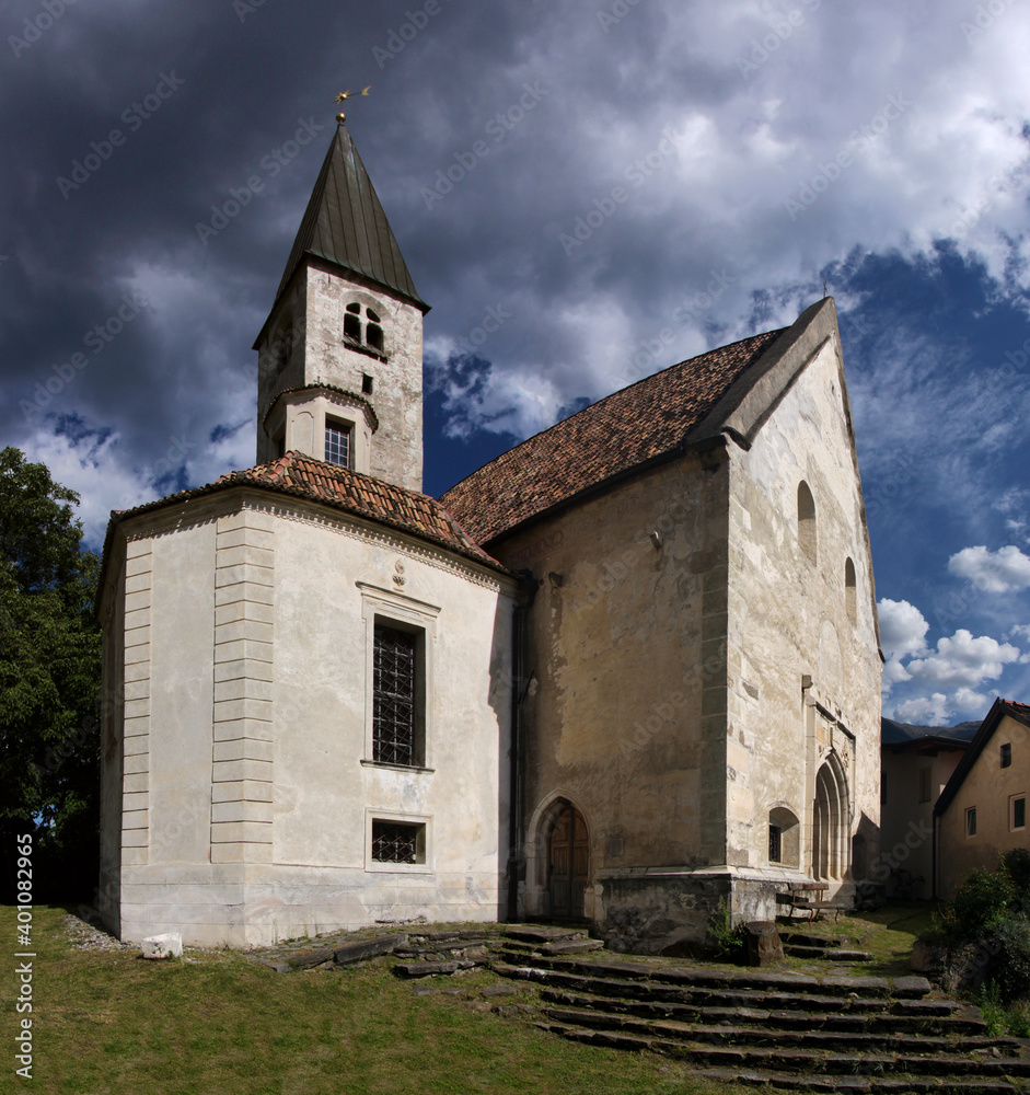 Haunted atmosphere at the old medieval Church of Our Lady on the Bichl in the historical village of Latsch, South Tyrol in Italy
