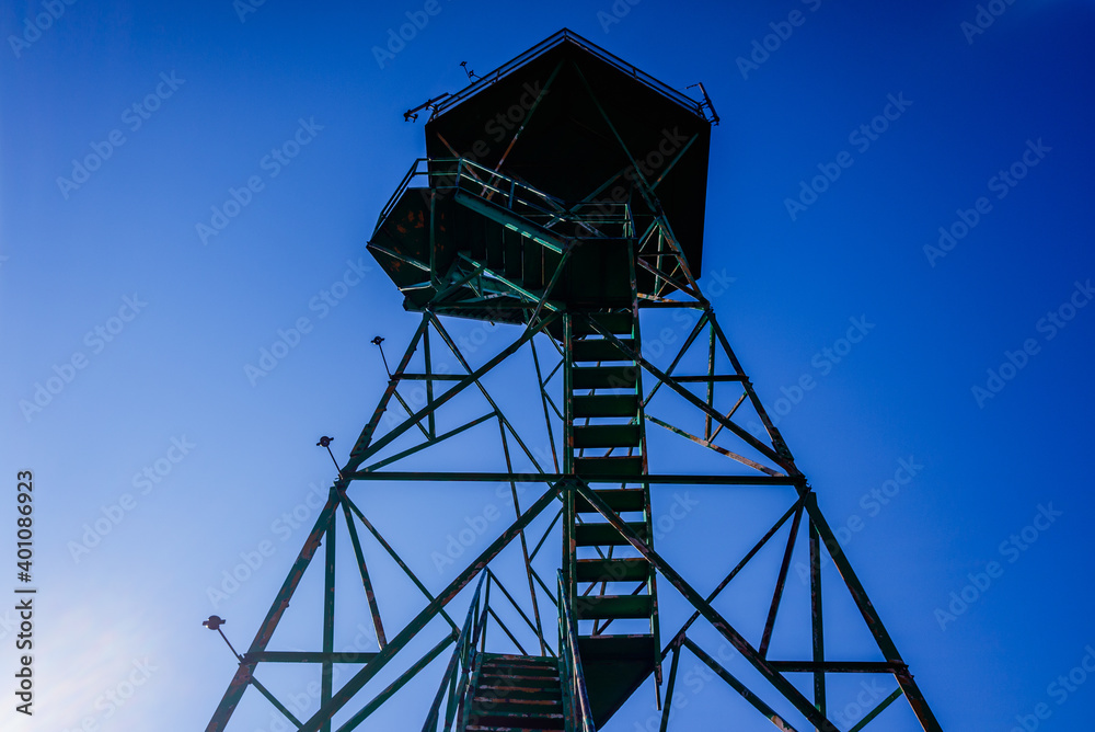 High forest watchtower on top of a peak. High forest watchtower on top of a peak.