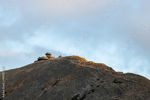 The peak of Śnieżka during the sunset photo