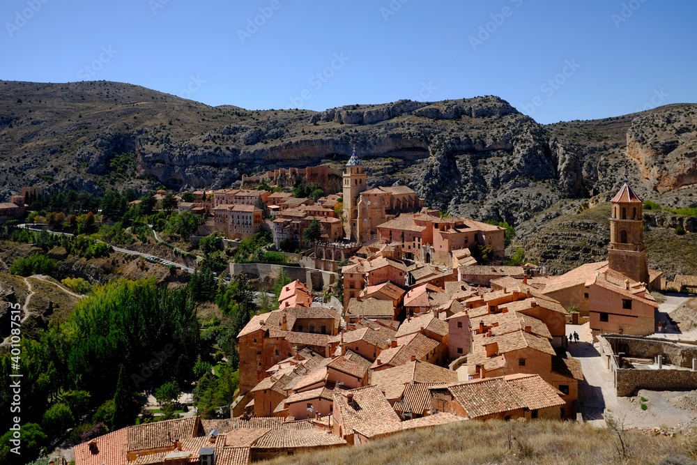view from the top of the village of Albarracin in the province of Teruel, Aragon Spain with a view of the roofs of the house, the cathedral of Albarracin and the church of Santiago,