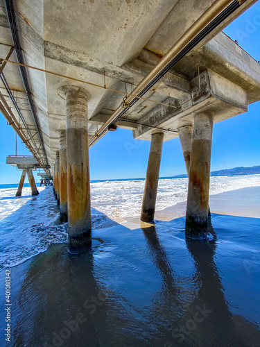 Under a Long concrete pier on the ocean