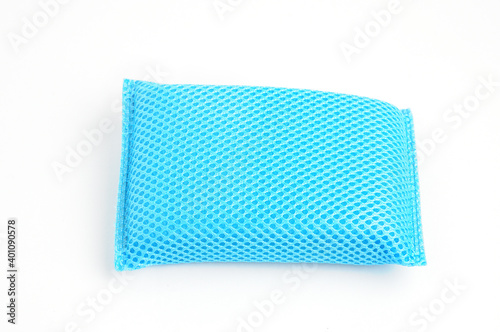 Sponge for washing dishes and plumbing on a white background