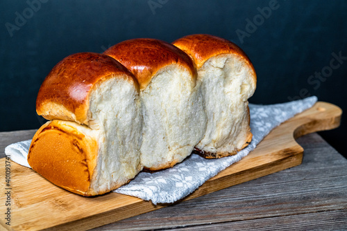 Japanese Hokkaido milk bread. Homemade sourdough loaf photo