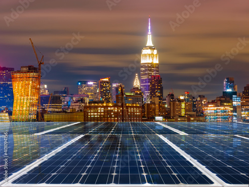 Photography Solar panel over cityscapes, solar power green energy for life concept,New York