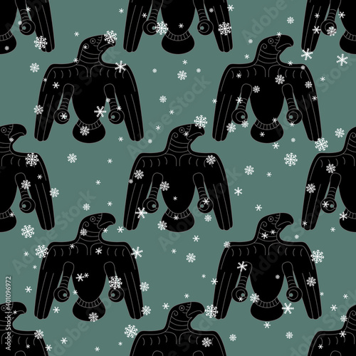 Seamless monochrome winter pattern with stylized totem birds and snowflakes. Permian animal style from ancient Siberia. Raven or eagle.