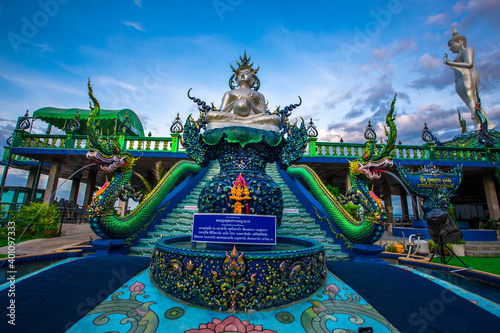 Background of religious attractions in Chonburi province of Thailand (Wat Khao Phra Khru viewpoint), with beautiful Buddha and Phaya Naga statues, tourists always come to make merit and take photos photo