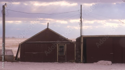 timelapse of a farm shed during the winter  photo