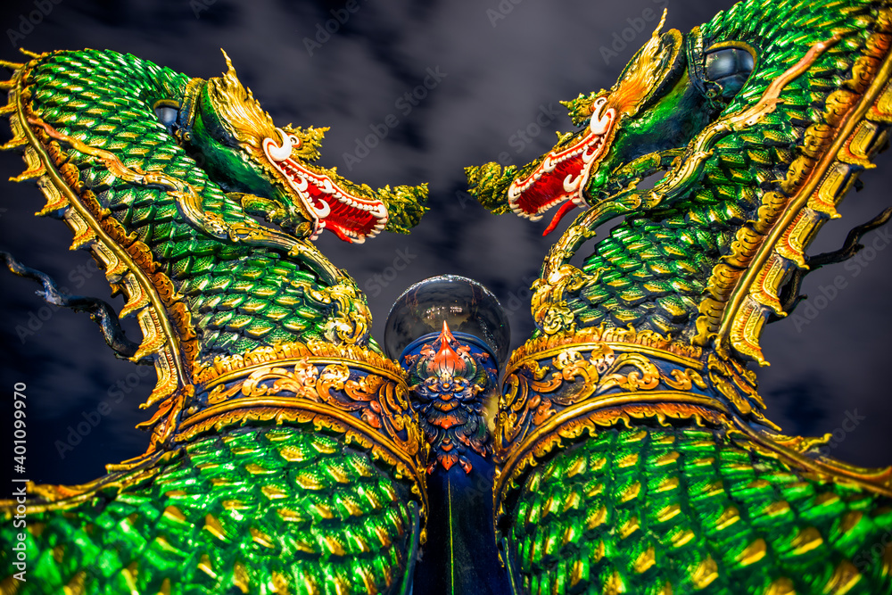 Fototapeta premium Wat Khao Phra Kru,Landmark of sriracha city with two of great Nagas guarded entrance to the view point and the crystal ball that gives an inverted view of the Sriracha scenery,Chonburi,Thailand